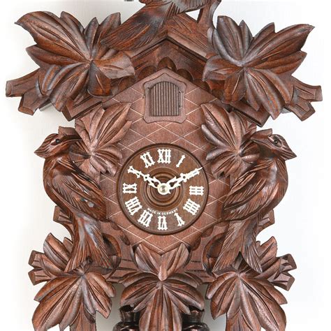 Carved 8 Day Cuckoo Clock With Large Cuckoo Bird Two Woodpeckers And