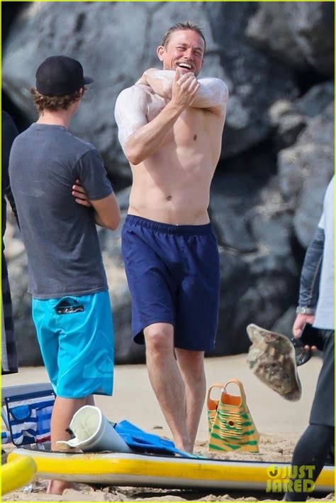 Shirtless Charlie Hunnam Puts On Sunscreen At The Beach In These Hot