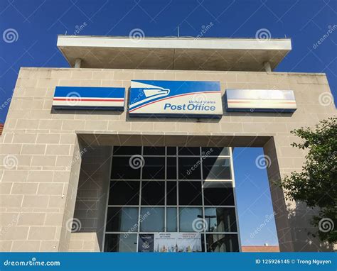 Close Up Logo At Facade Entrance Of Usps Store In Irving Texas Usa