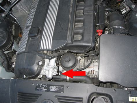 The leak is right were the return line bolts to the bottom of the turbo. Leaking Hose (Oil?)
