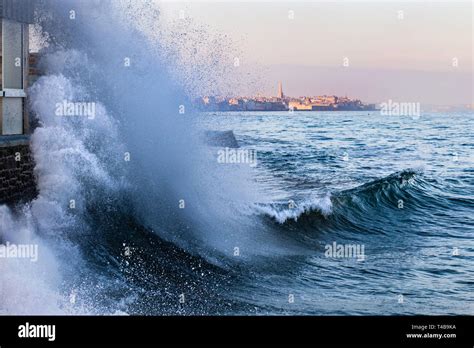 A Wave Breaks In Rochebonne Saint Malo France In February 2019 Stock
