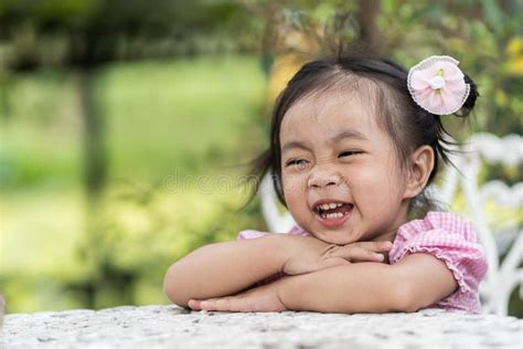 Asian Girl Are Laughing And Happily Stock Image Image Of Face Cheerful 127558275