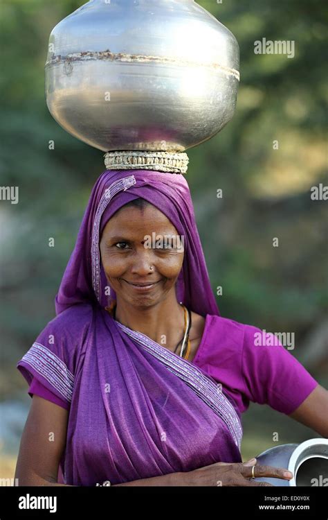 Indian Woman Carrying A Pot Of Water India Stock Photo Alamy