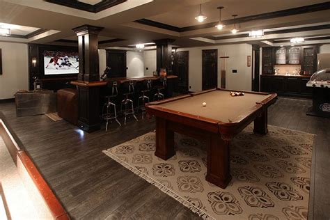 Many man caves, with the home bar, are situated in the basement. - Edwards Smith Construction, LLC | Man cave basement ...