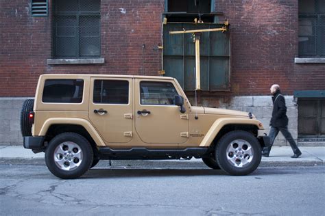 2014 Jeep Wrangler Unlimited Sahara 4x4 Side View