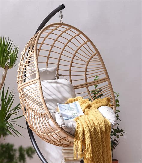 Whether you are looking to add a new accent chair to your living room or need a stylish patio set for outdoor dining, wicker and rattan chairs are up to the task! Marigold Rattan Effect Hanging Egg Chair | Shop Designer ...
