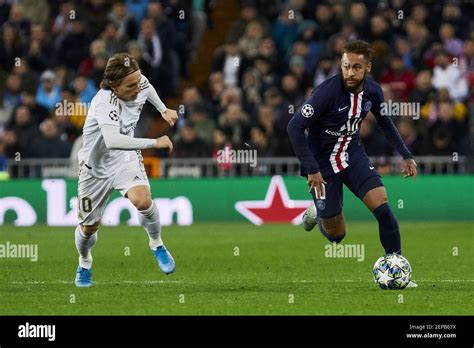 Luka Modric Of Real Madrid And Neymar Jr Of Paris Saint Germain In