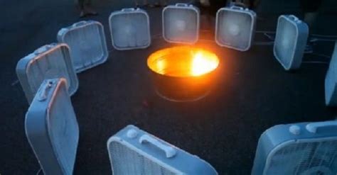 A Fire Pit Coupled With Several Fans Creates One Of The