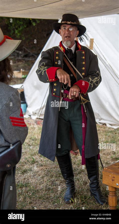 Man Stands In Confederate Officer Uniform During Civil War Stock Photo