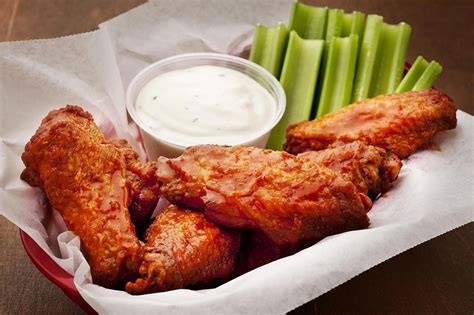Although buffalo wings and hot wings differ in spiciness, the designations are often used interchangeably on menus across america. All-American Buffalo Chicken Wings Recipe