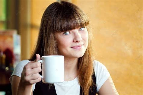 A Lady Relaxing With Her Coffee At A Cafe Photo Background And Picture For Free Download Pngtree