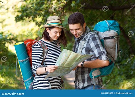 Two Hikers Looking Map Staying On Forest Trail Stock Image Image Of