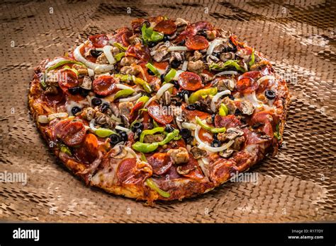 Medium Pizza With Black Olives Italian Sausage Linguica Mushrooms