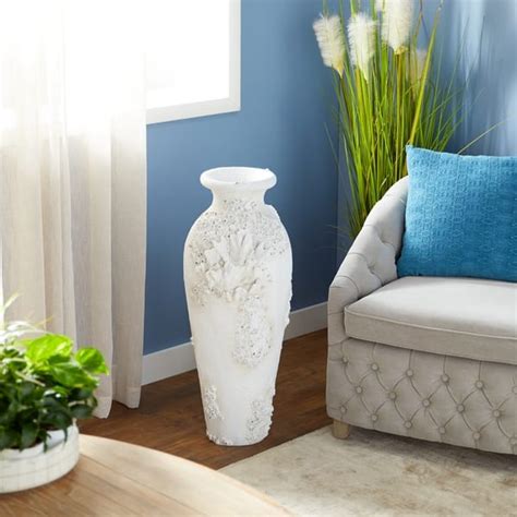 The Curated Nomad Barnacles Nautical Tall White Stone Floor Vase Bed