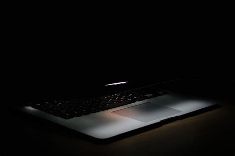 Photography Of Laptop In A Dark Area · Free Stock Photo