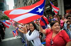 puerto rican parade participants mourn celebrate csmonitor matthews bebeto ap