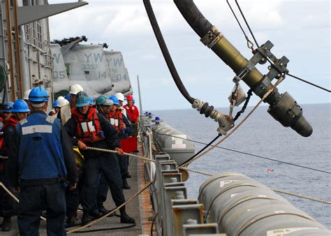 Fileus Navy 081001 N 2183k 085 Crew Members Hoist The Fuel Probe To