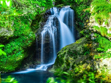 Beautiful Waterfall In The Green Natural Forest Of The Vintgar Stock