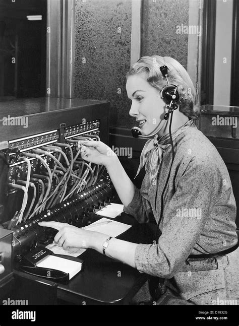Telephone Operator Working At Switchboard Stock Photo Alamy