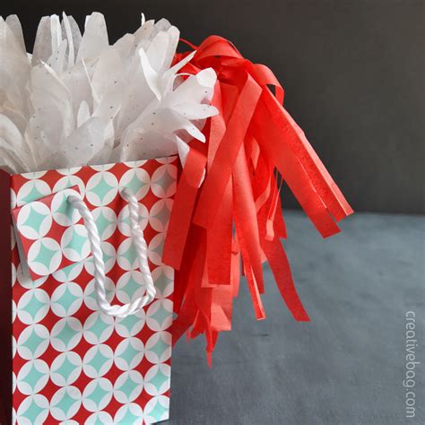 Tissue paper is no longer just for stuffing gift bags. the creative bag blog: Creative gift wrapping ideas ...
