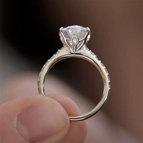 Oval Diamond Solitaire Engagement Ring With Pav Set Diamond Band