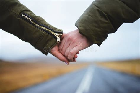 Holding Hands On Road Stock Photo Image Of Touching 83931428