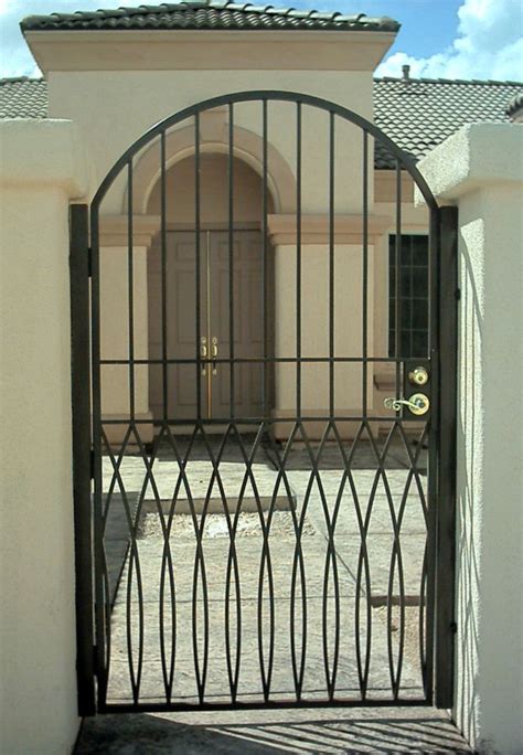Follow our guide to paint your gate to a professional standard. Depiction of Iron Gate Designs for Homes | Iron gate design, Gate design, House gate design