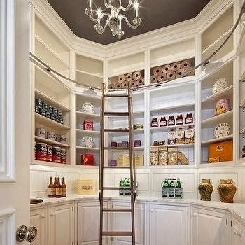 The main contrasting kitchen island features a fold of white solid surface over the reclaimed wood and continues unsupported all the way to the end of the breakfast nook. Walk In Pantry Ideas - Transitional - kitchen - Hayburn and Co