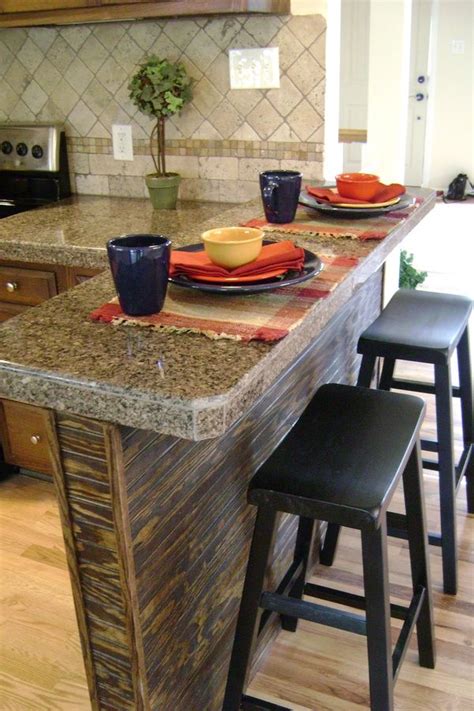 A floating black table with a couple of stools is what you need for a small kitchen. Simple breakfast bar | Breakfast bar kitchen, Kitchen ...