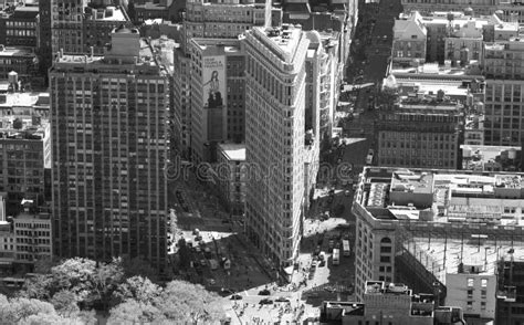 Scenic Aerial Grayscale View Of A Flatiron Building Surrounded With