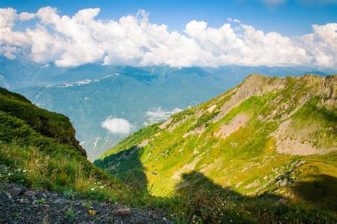 Green Land Landscape Mountains Valley In Summer Afternoon With Gentle