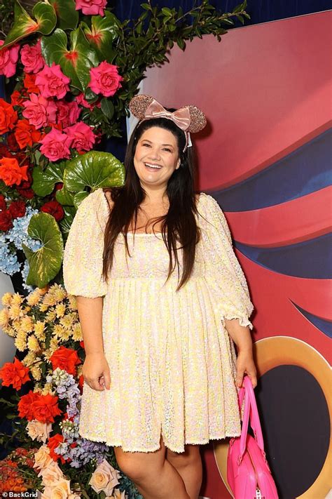 Kyly Clarke Showcases Her Slim Frame In A Pleated Dress At A Disney