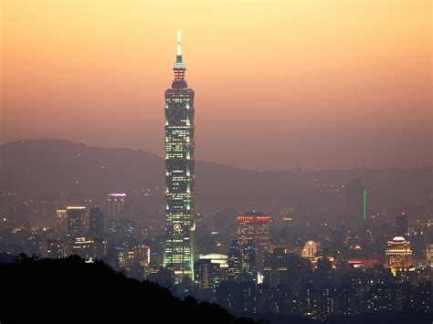 The large yellow sphere, which sits between the 92nd and 87th floors, sways to offset the building's movements caused by strong gusts. Taipei 101 At Late Dusk Free Stock Photo - Public Domain ...