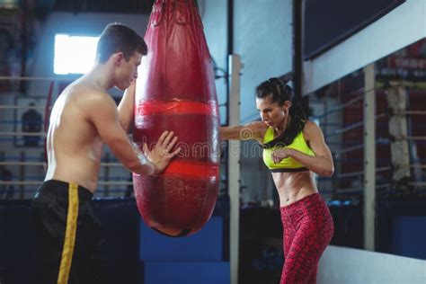 Female Boxer Practicing Boxing With Punching Bag Stock Image Image Of