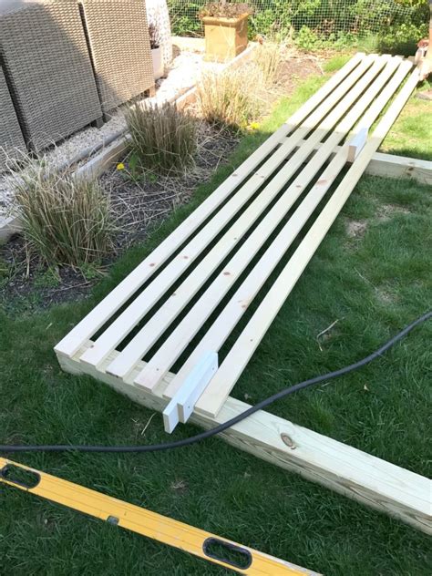 This diy privacy fence does the trick and it only took a few hours to build! Modern Wood Slatted Outdoor Privacy Screen: Details On How ...