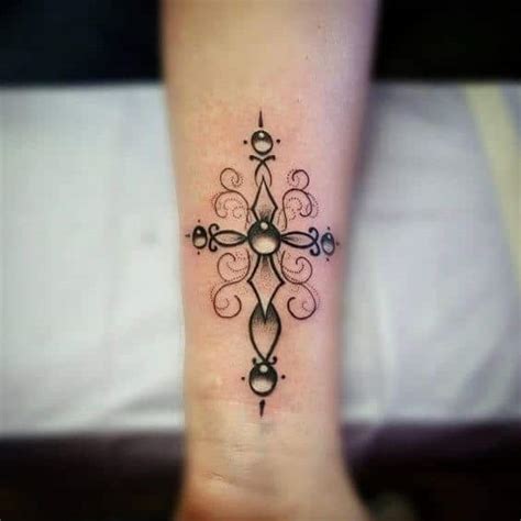 Cross tattoos usually adorn the male body (shoulder, back, arm). Cross Tattoos for Women - Ideas and Designs for Girls