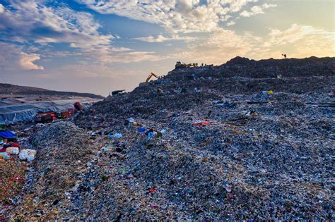 Mountain Of Landfill During Dawn · Free Stock Photo