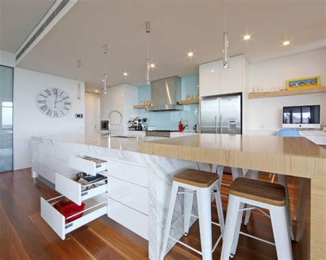 The cabinets are flat pack and custom fit the table. Island Bench Design Ideas & Remodel Pictures | Houzz