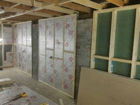 You can buy insulation kits for standard metal garage doors, or you can cut pieces of rigid foam insulation to fit each door panel/section. Grogley Junction: The Garage (Modelling Room) update