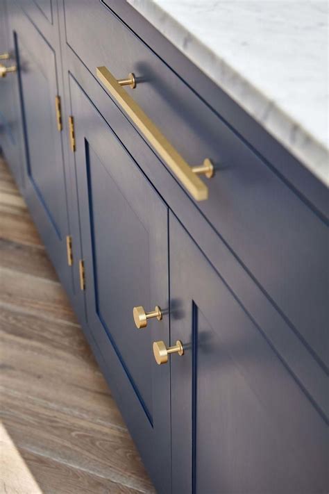Dark Blue Shaker Style Kitchen Cabinets With Polished Brass Door