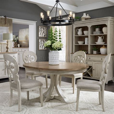 A bright white dining room. Farmhouse Reimagined 5Pc Dining Set 652-DR-PDS by Liberty