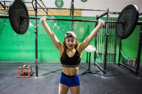 girl lifts weights more than adults twice her age can you guess how old she is daily star
