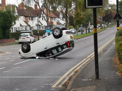 woman hospitalised after car lands on roof in sutton coldfield crash birmingham live