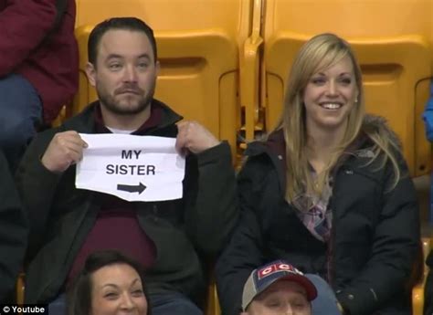 Most Awkward Kiss Cam Ever As Man Unfolds My Sister Sign At