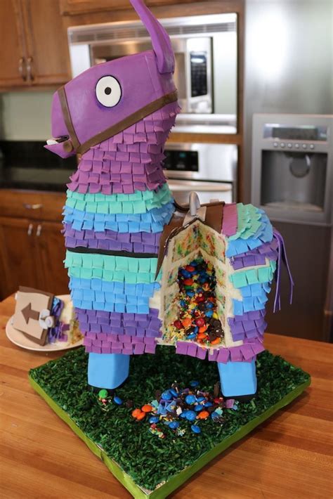This specific llama comes loaded with one figure, 10 weapons, four pieces of back bling, and eight pieces of exclusive building materials. Fortnite Loot Llama Cake | Boy birthday cake, Kids birthday party, Birthday party cake