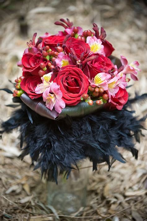 Now, it is high time for you. red rose & black feather bouquet | Feather bouquet ...
