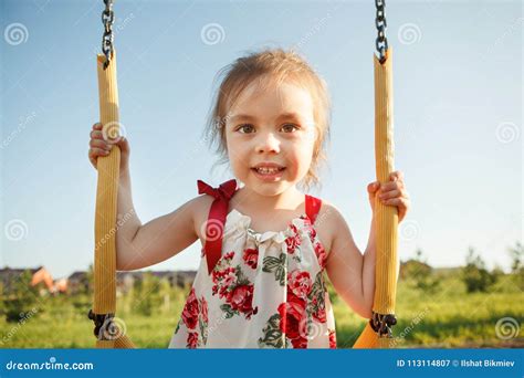 Little Cute Girl Swinging On Swing Stock Image Image Of Dress Child