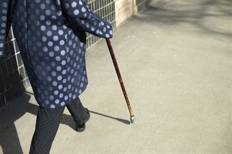 Grandma With Walking Stick Woman Walks On Asphalt Stock Image Image Of Lifestyle Jean 247756453