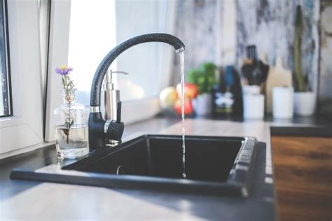 Next, pour the vinegar down the drain. How to Clean a Smelly Kitchen Sink? - Ecooe Life