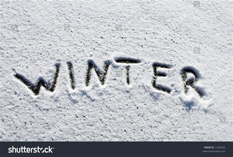 Winter Word Written On Snow Winter Season Concept Stock Photo 1322434